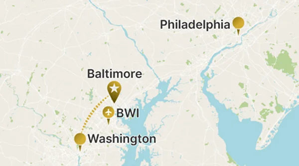 Map showing a dotted route from Washington, D.C., leading northeast to Baltimore (star marker) and passing near BWI Airport.